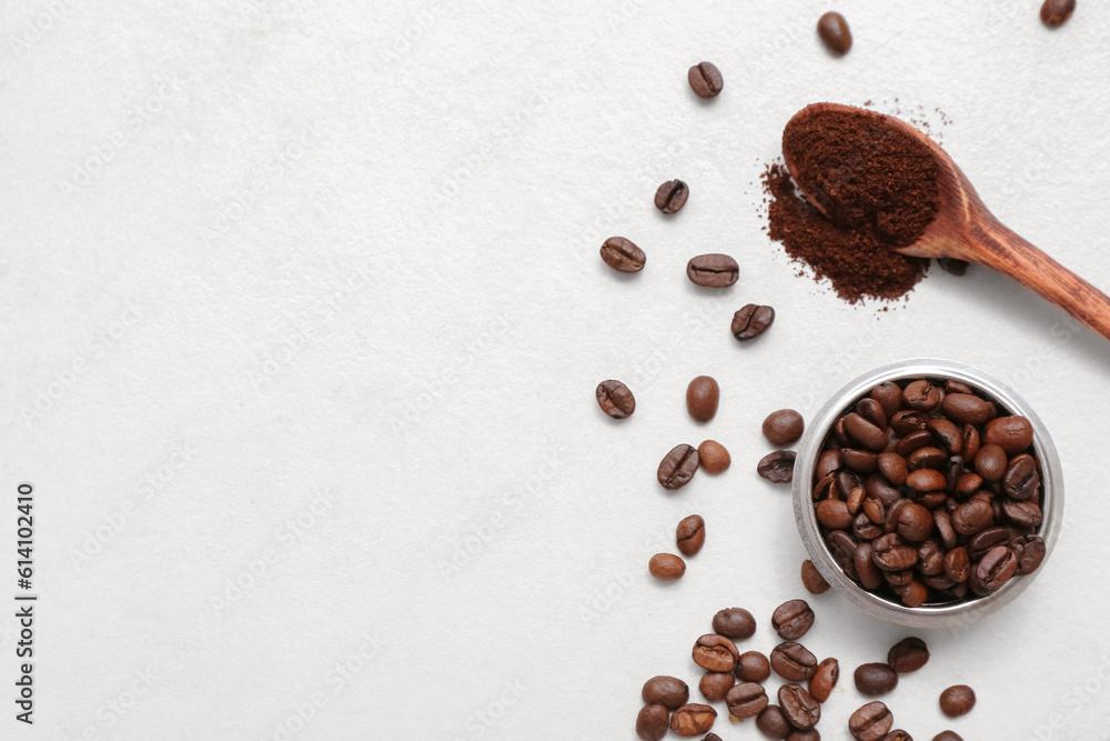 Bowl with coffee beans and powder on light background