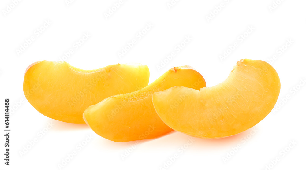 Pieces of ripe apricot isolated on white background