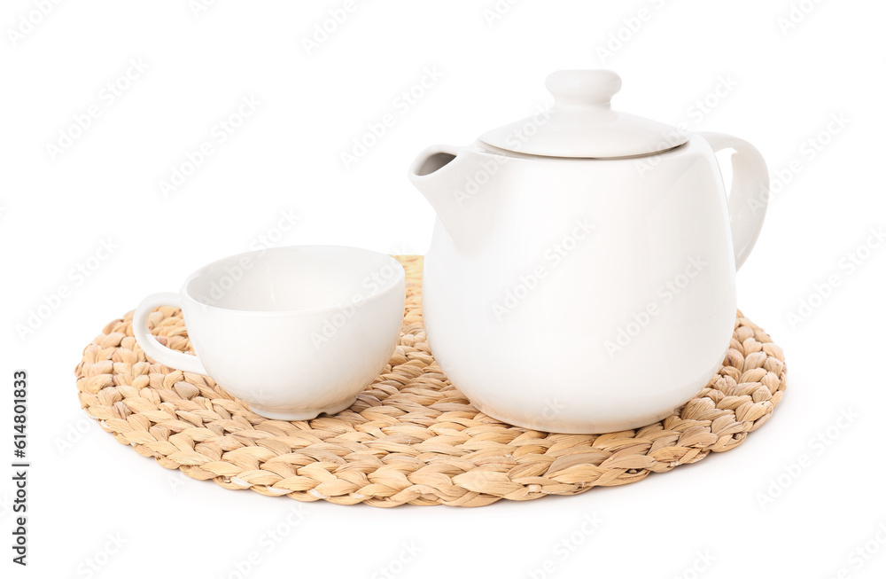 Wicker mat with teapot and cup isolated on white background