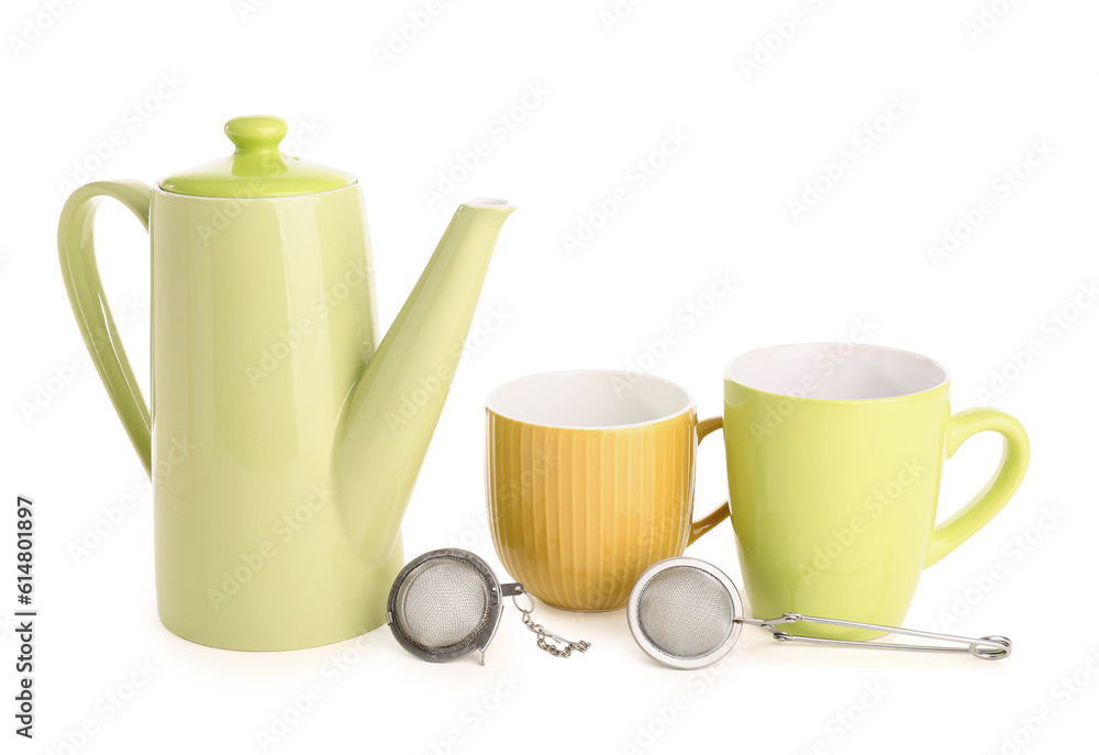 Teapot, mugs and infusers isolated on white background