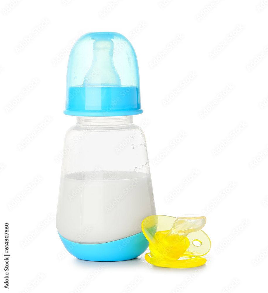 Bottle of milk for baby with pacifier isolated on white background