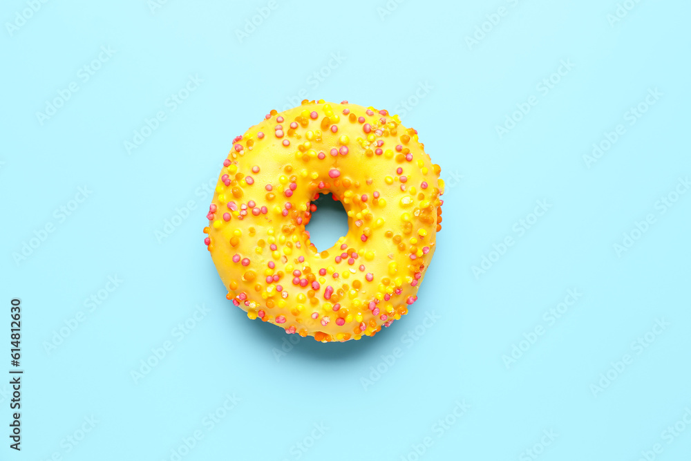 Sweet donut on blue background