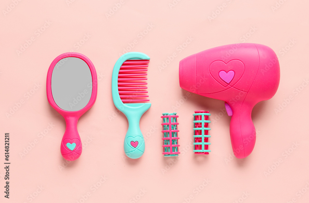 Set of hairdressing accessories on pink background. Childrens Day celebration