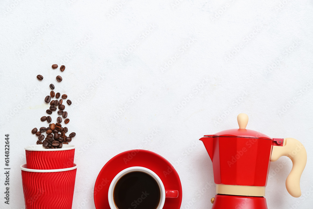 Cups with beans, hot espresso and geyser coffee maker on light background