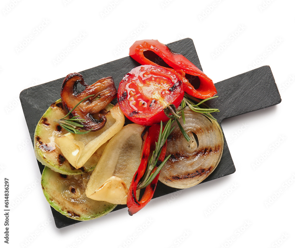 Slate board with different tasty grilled vegetables on white background