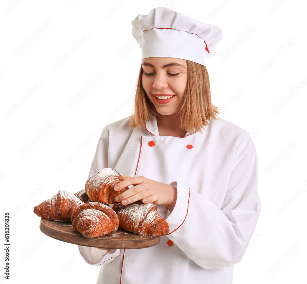 Female baker with board of tasty croissants on white background