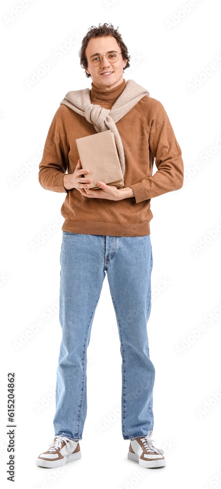 Young man with books on white background