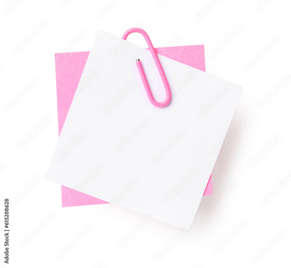 Colorful sticky notes with paper clip on white background