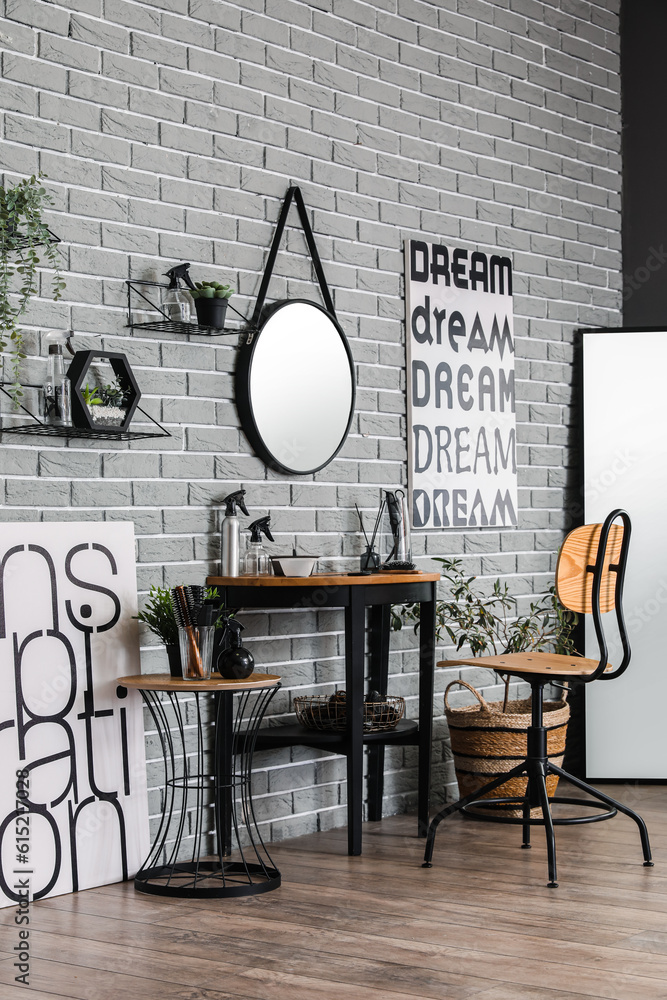 Interior of modern beauty salon with mirror and table