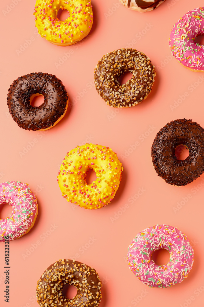 Sweet donuts on pink background