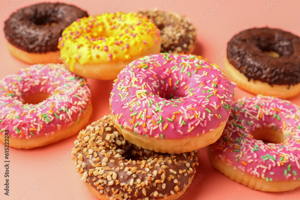 Sweet donuts on pink background