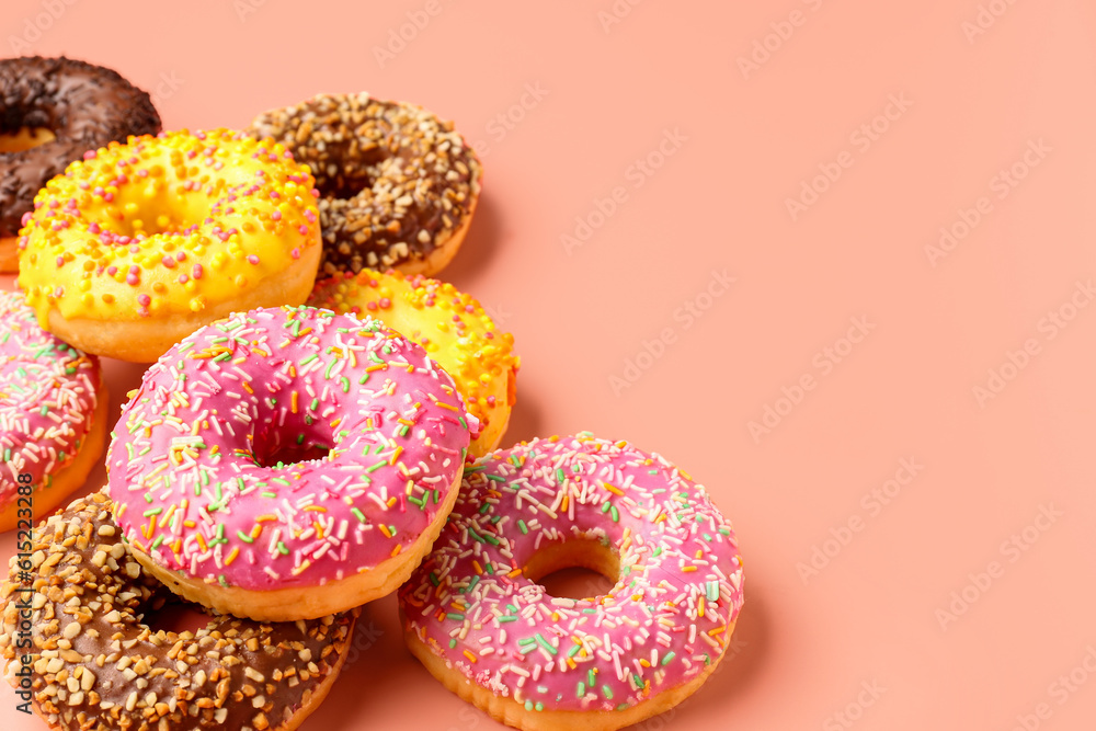 Sweet donuts on pink background