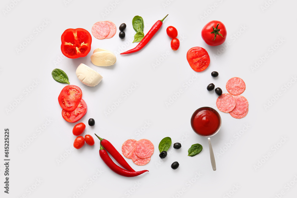 Frame made of fresh ingredients for preparing pizza on white background