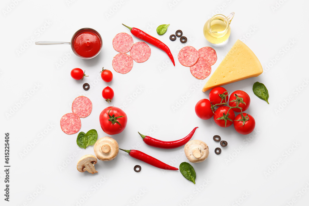 Frame made of fresh ingredients for preparing pizza on white background