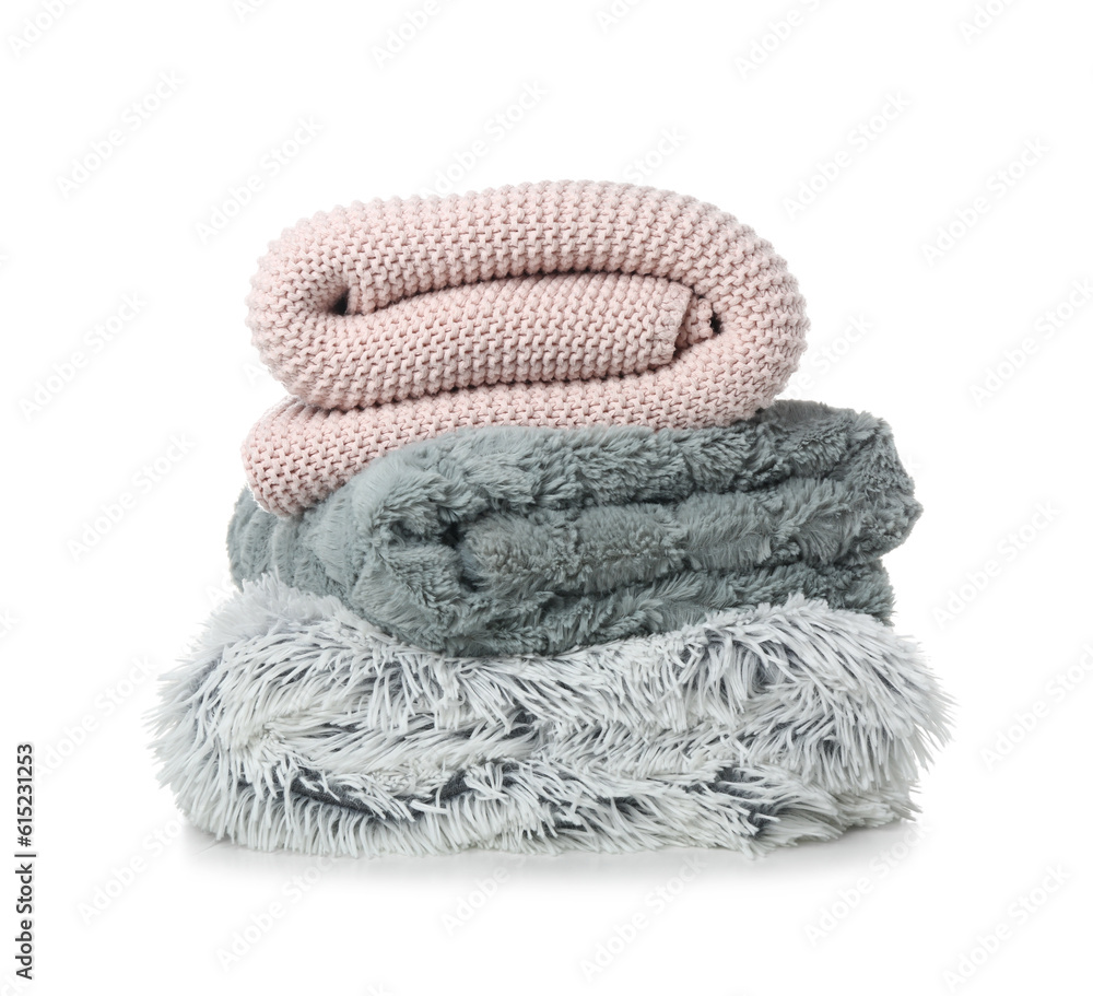 New soft folded blankets on white background