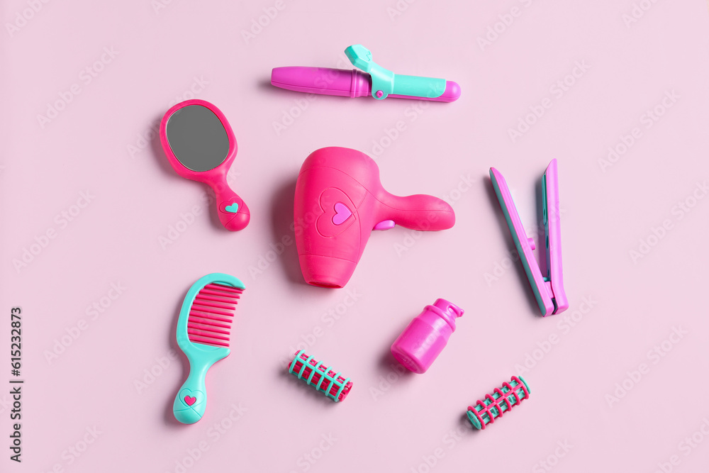 Set of hairdressing accessories on pink background. Childrens Day celebration