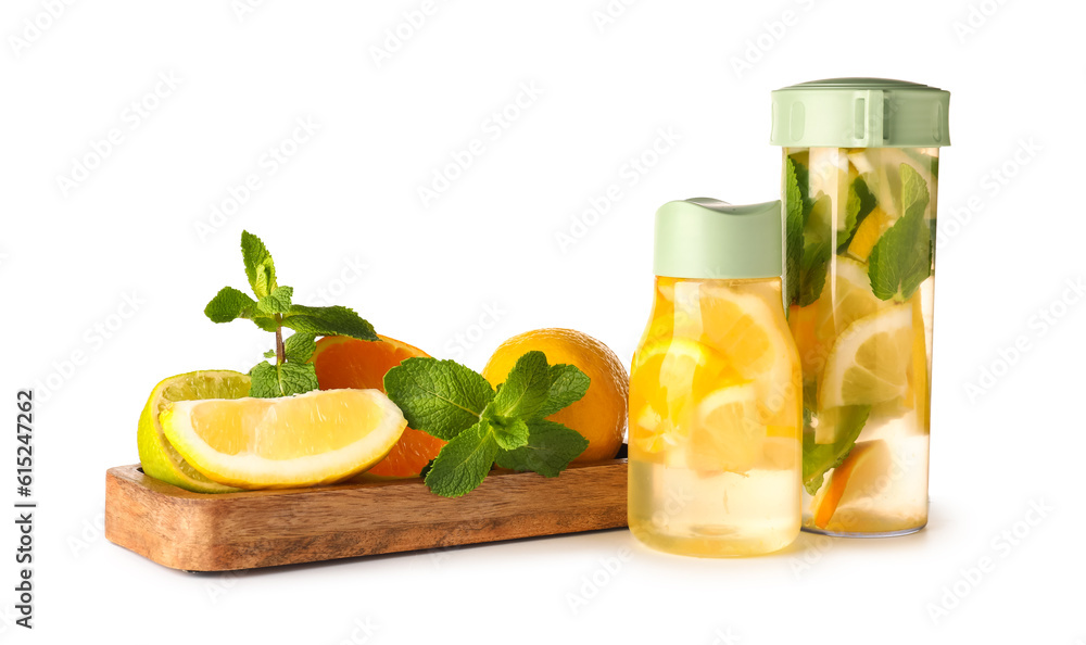 Sports bottles of infused water and board with different citrus fruits on white background