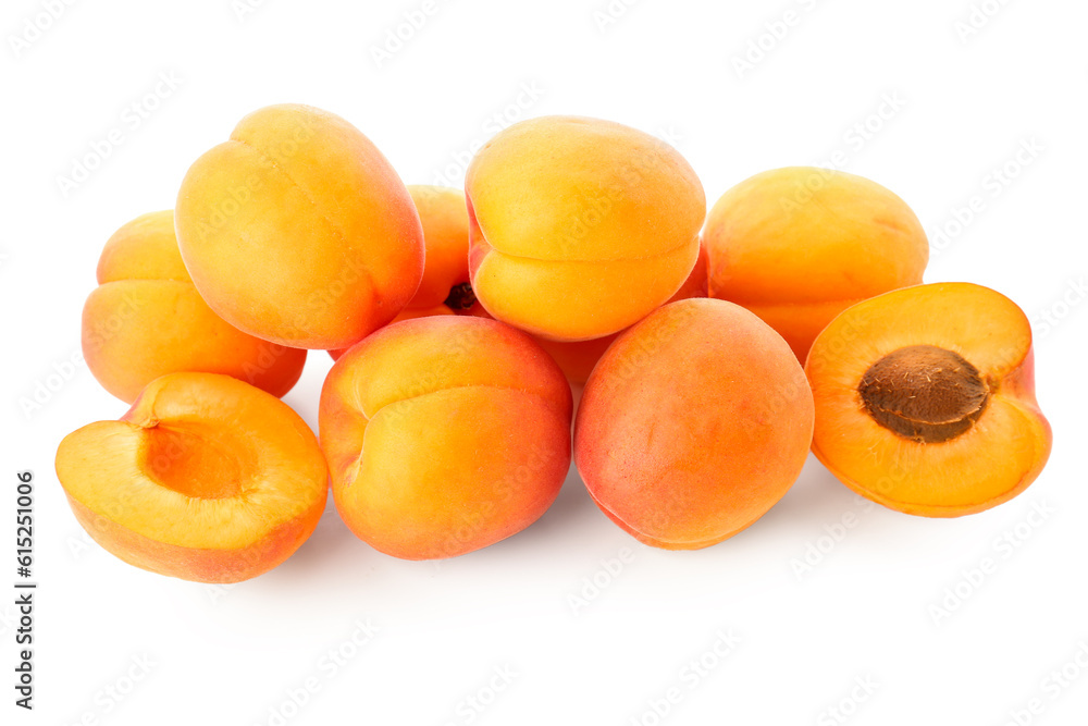 Heap of ripe apricots isolated on white background