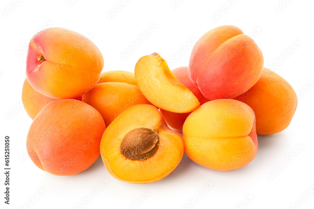 Heap of ripe apricots isolated on white background