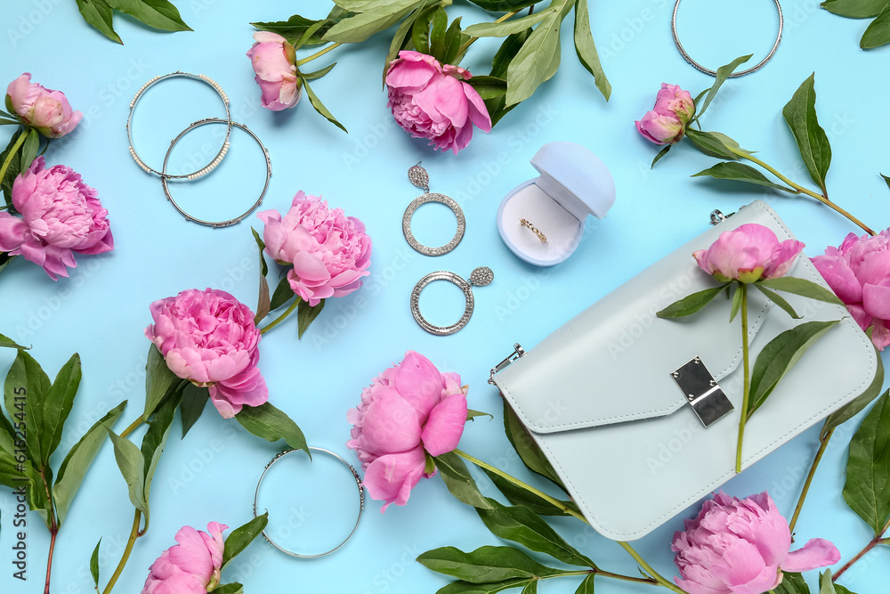 Composition with beautiful female accessories and peony flowers on color background