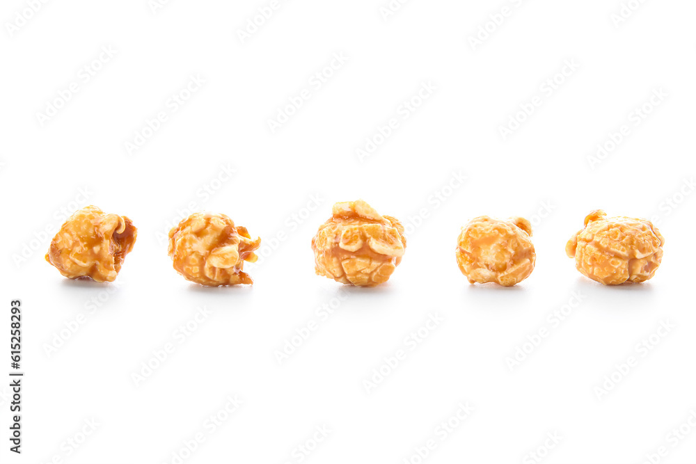 Tasty caramel popcorn isolated on white background