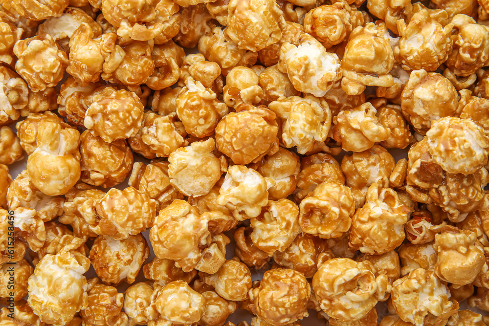 Tasty caramel popcorn as background