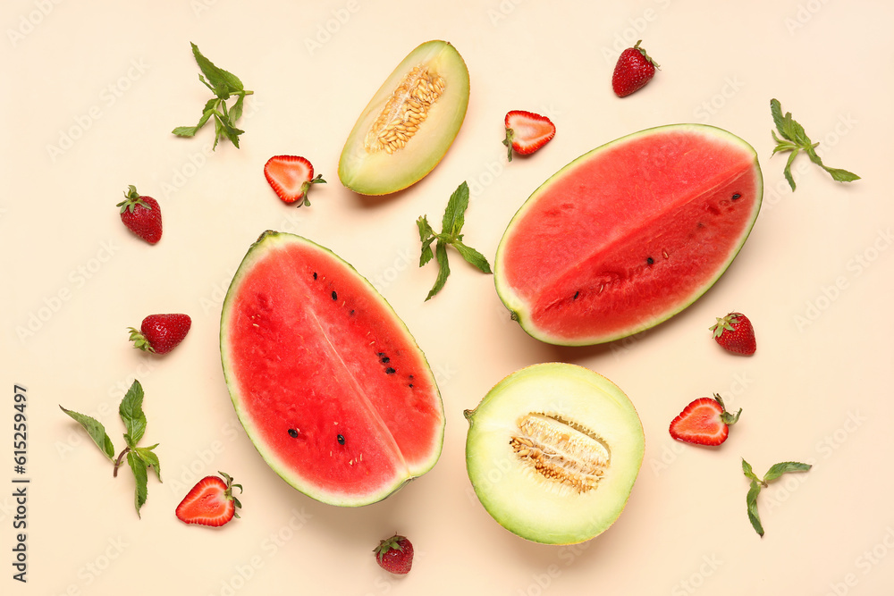 Pieces of fresh watermelon and different berries on orange background