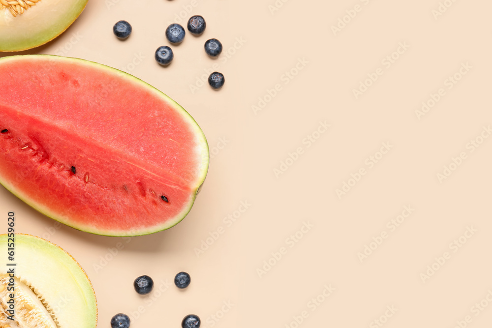 Piece of fresh watermelon and different berries on orange background