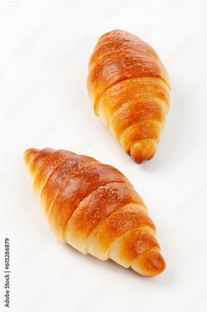 fresh croissant isolated on white background.