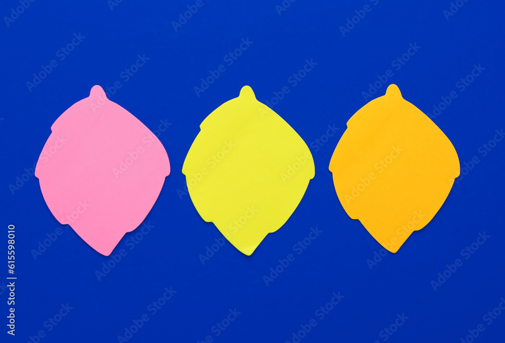 Colorful sticky notes on blue background