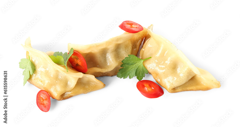 Tasty Chinese jiaozi, red pepper and parsley on white background