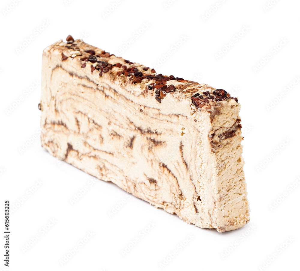 Piece of tasty marble halva on white background