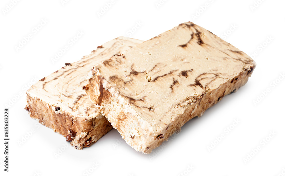 Pieces of tasty marble halva on white background