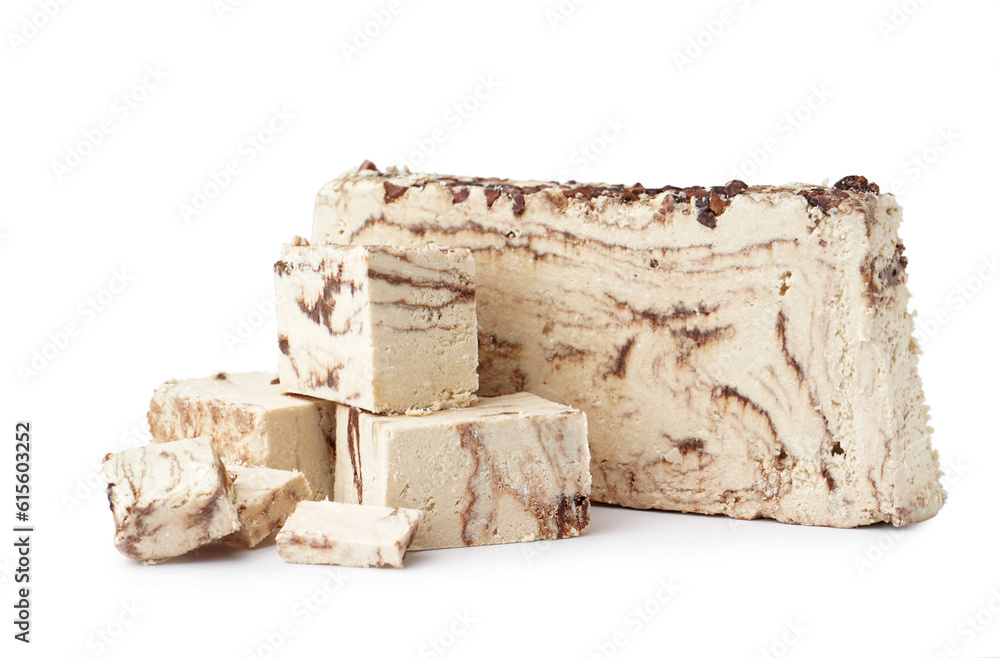 Pieces of tasty marble halva on white background