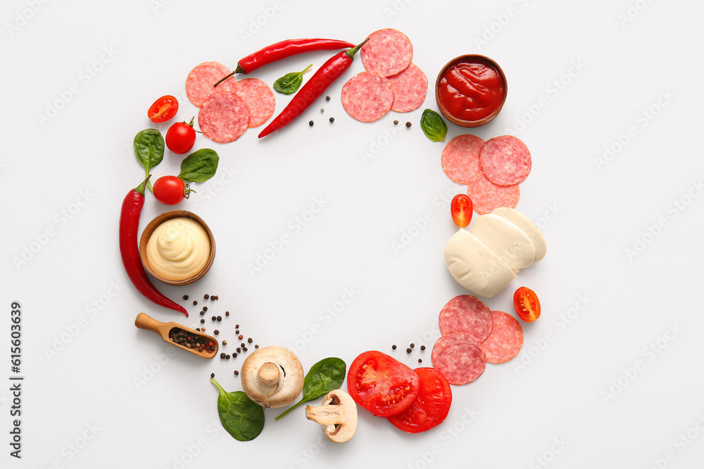 Frame made of fresh ingredients for preparing pizza on white background