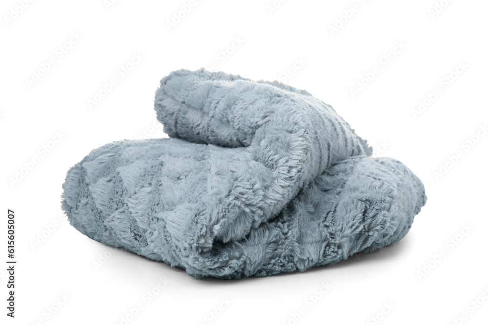 Soft woolen blanket on white background