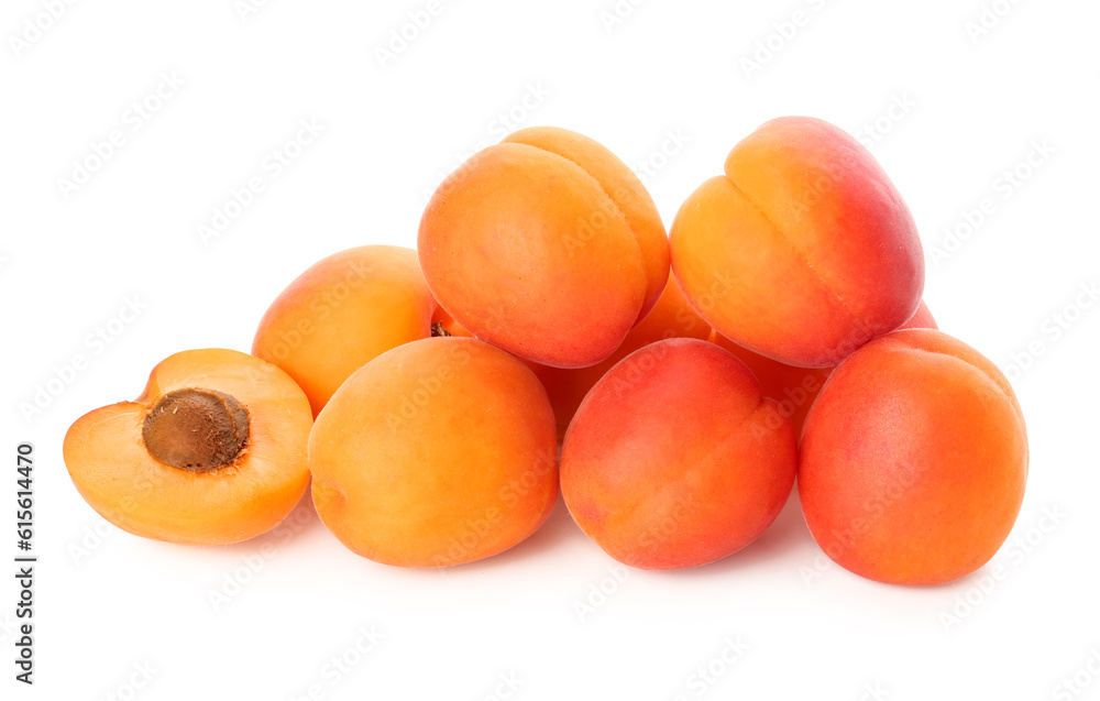 Heap of ripe apricots isolated on white background