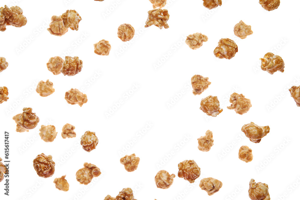 Frame made of flying tasty caramel popcorn on white background