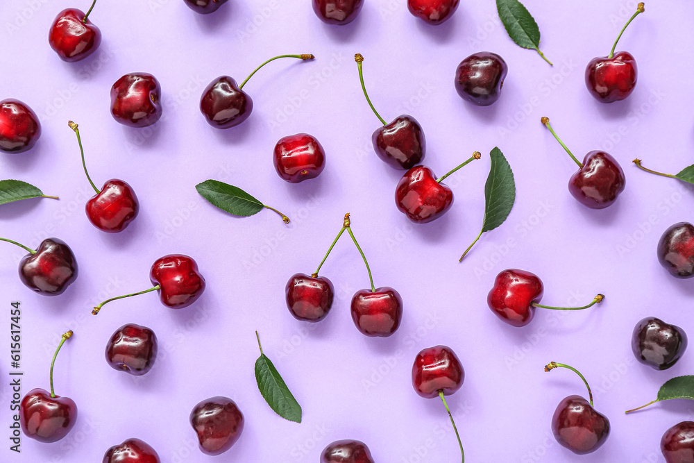 Many sweet cherries on lilac background