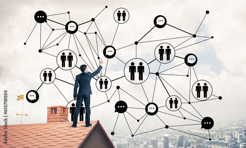 Businessman on house roof presenting networking and connection c