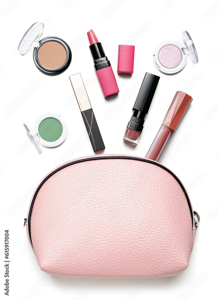 Cosmetic bag with makeup products on white background