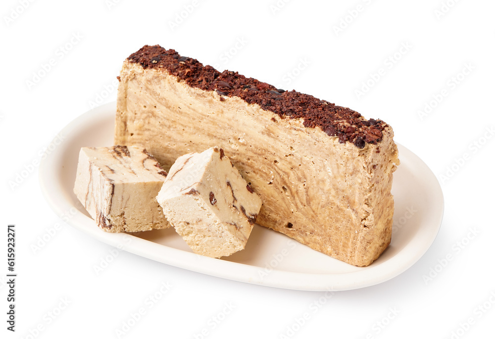 Plate with pieces of tasty marble halva on white background