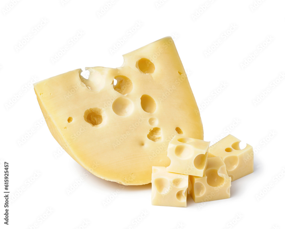 Piece and cubes of Swiss cheese on white background