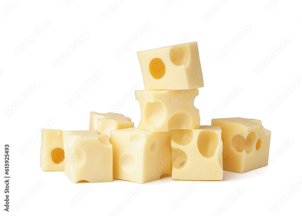 Cubes of Swiss cheese on white background