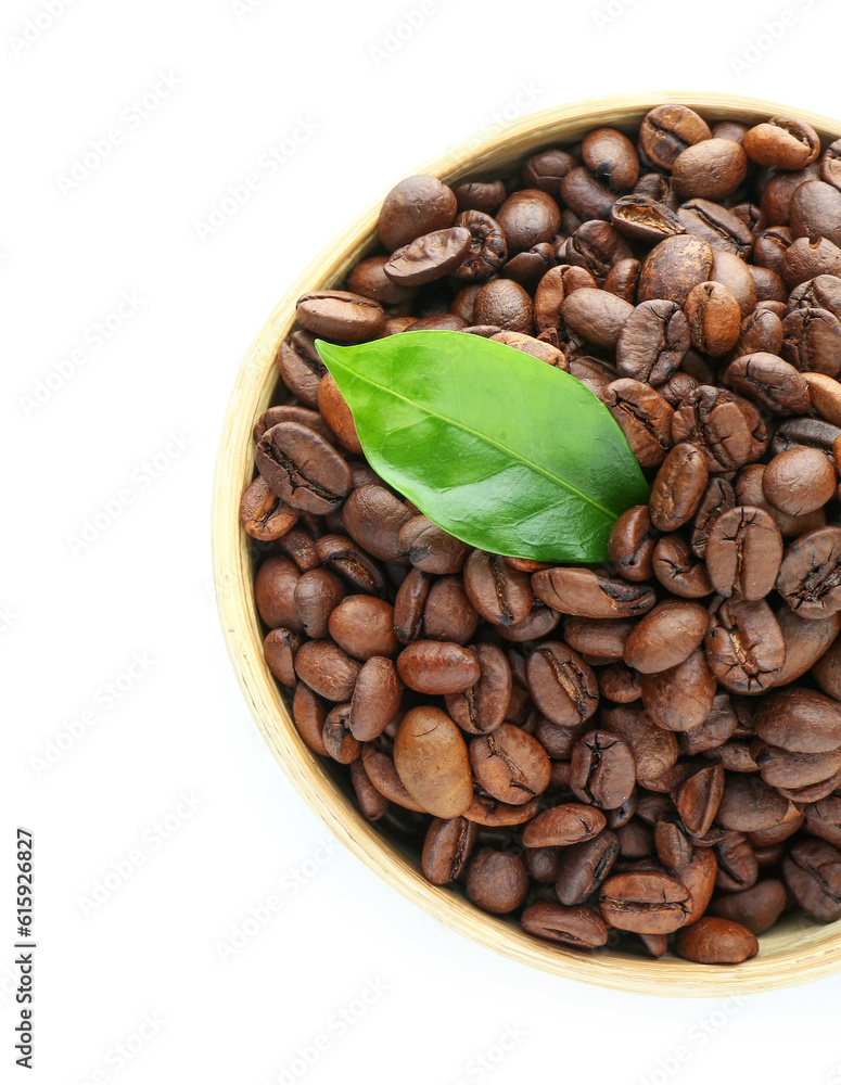 Bowl with coffee beans on white background