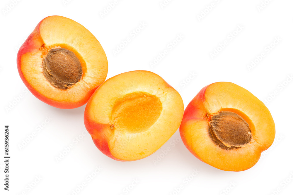 Halves of ripe apricot isolated on white background