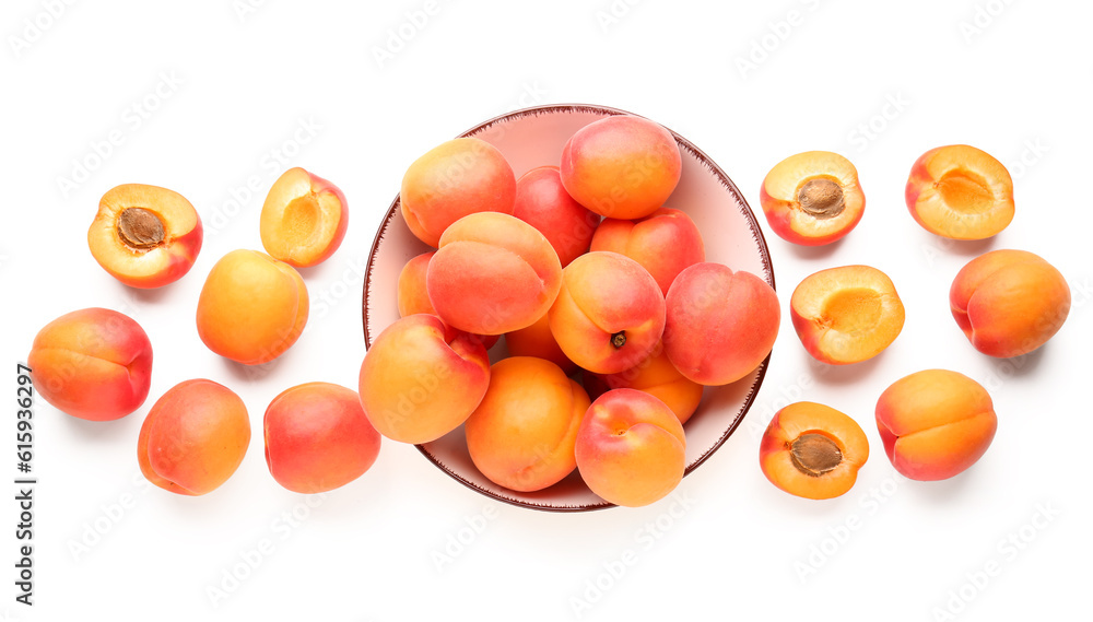 Bowl with ripe apricots isolated on white background