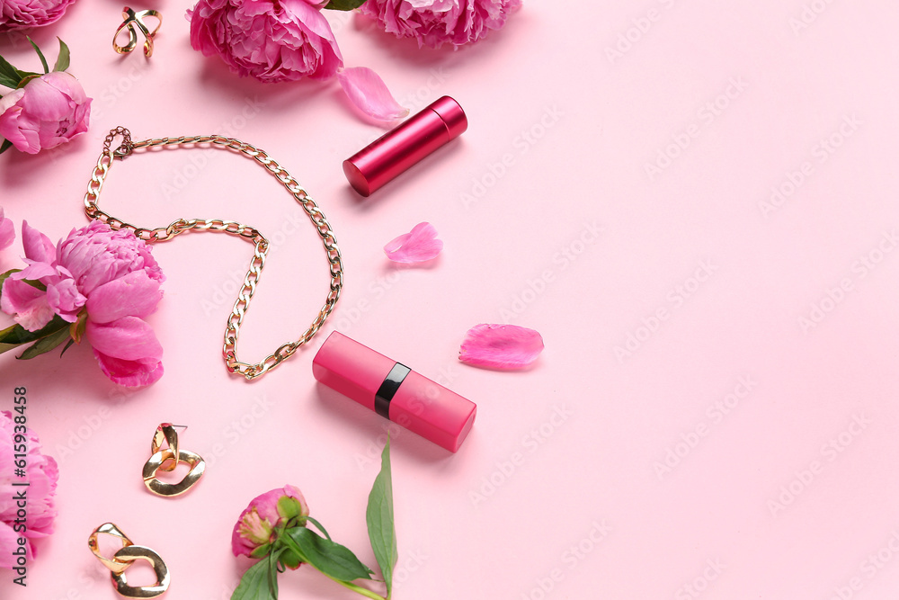 Composition with stylish female accessories, lipsticks and beautiful peony flowers on pink backgroun