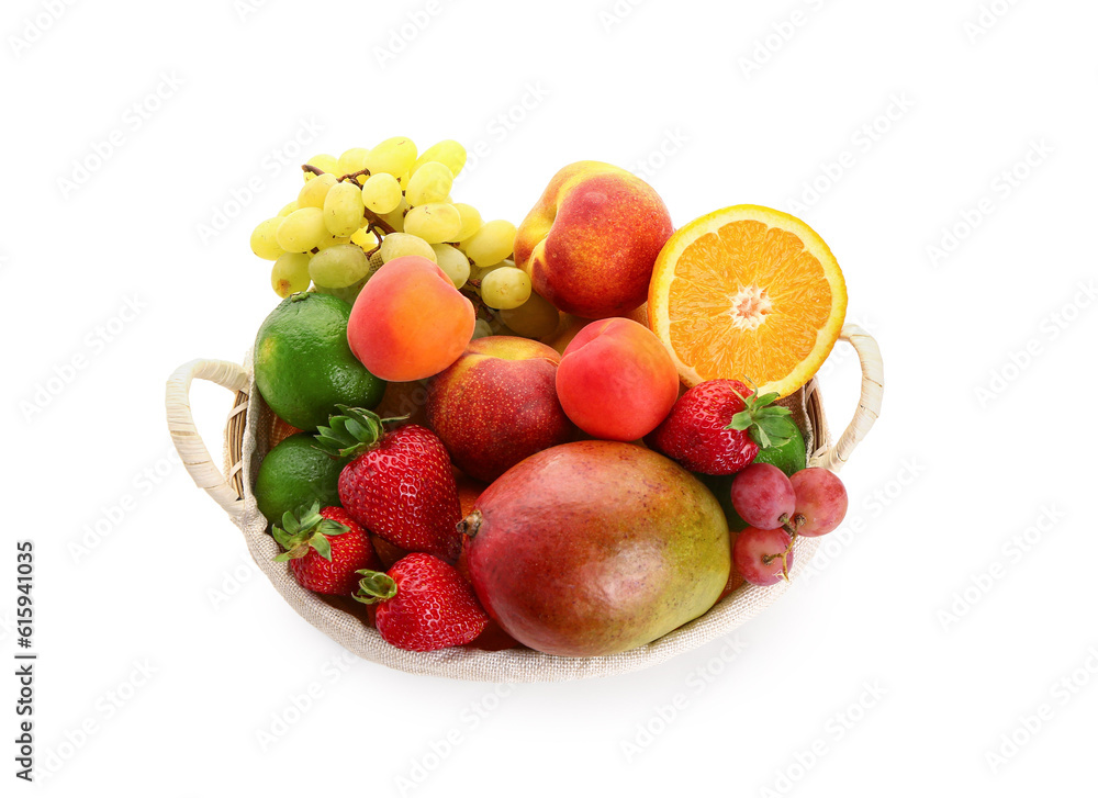 Wicker basket with different fresh fruits on white background