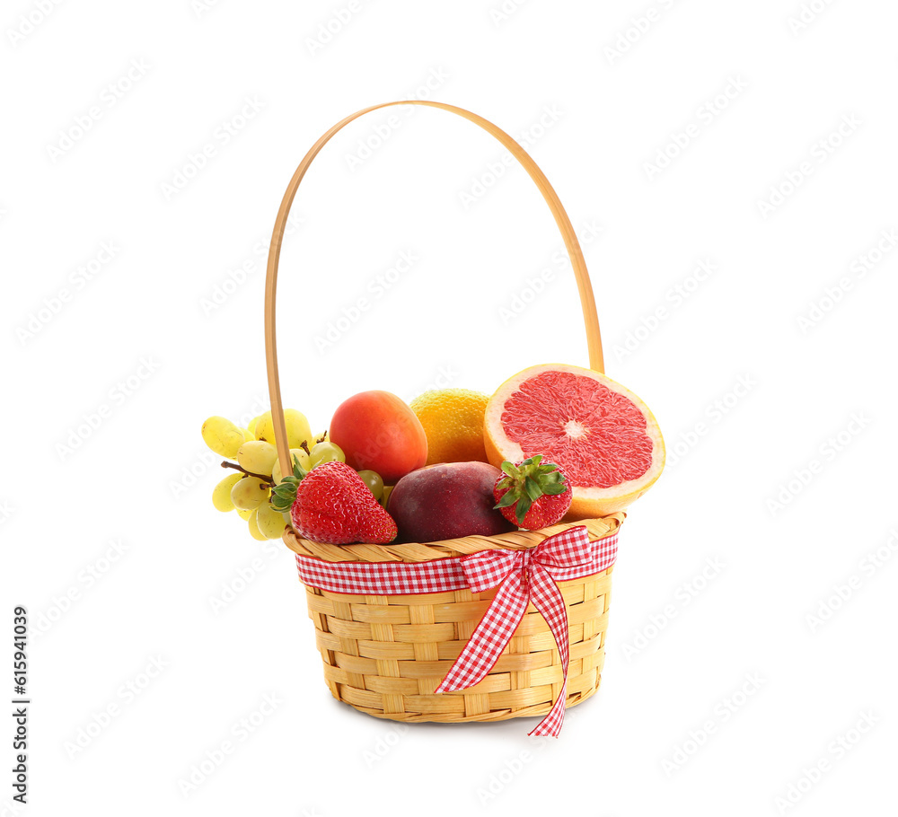 Wicker basket with different fresh fruits on white background